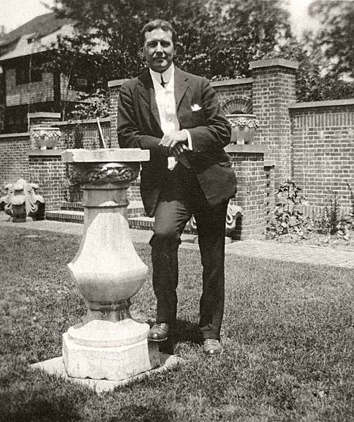 503px-John_McCrae_leaning_against_a_sundial.jpg